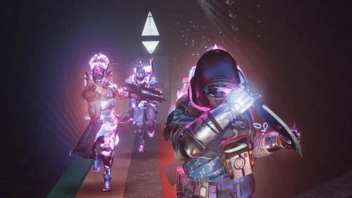 Three Prismatic Guardians navigating a dimly lit area in Destiny 2