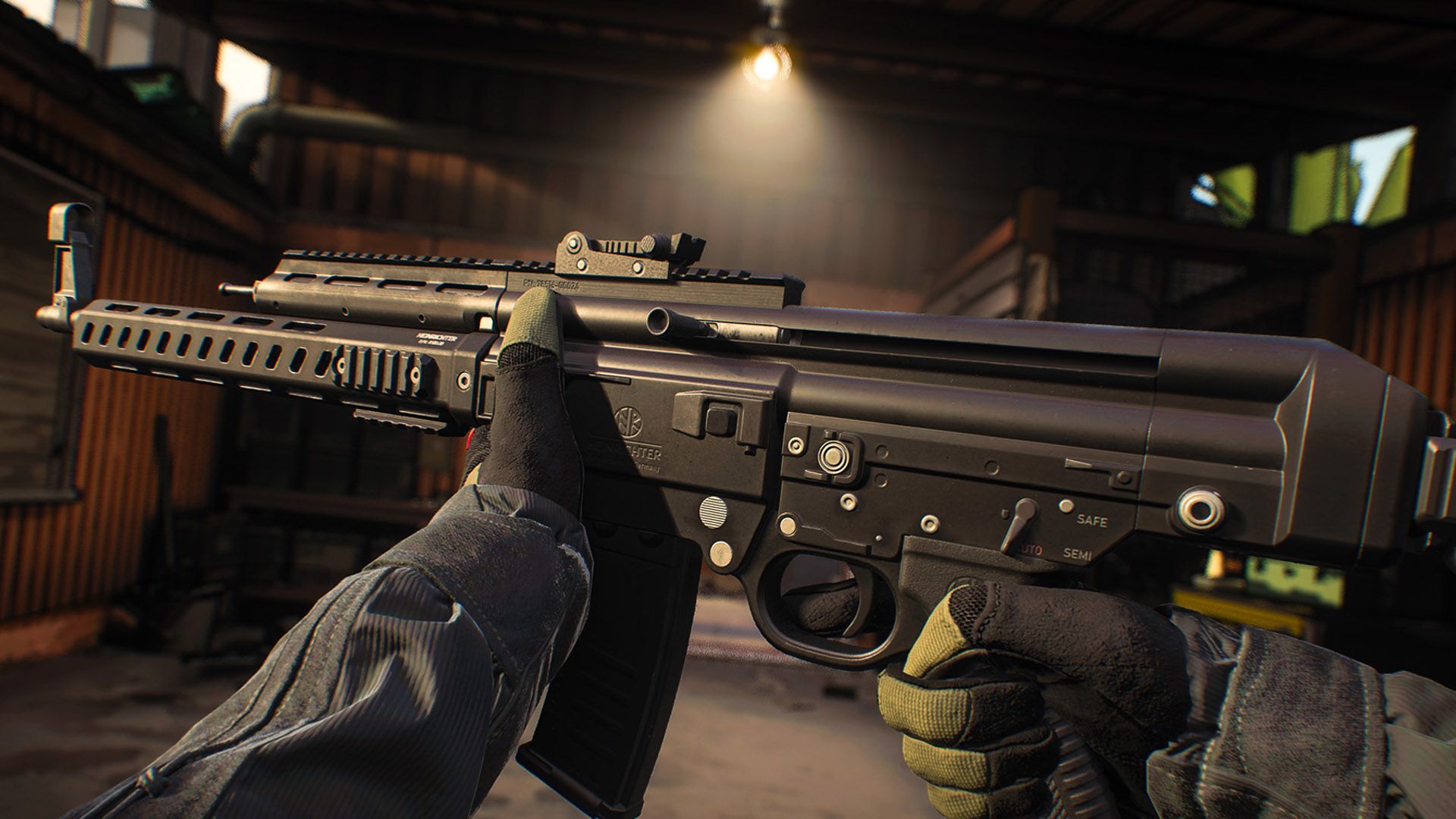 MW3 player holding an STG assault rifle sideways. A light hanging from the ceiling of a building is lighting up the room in the background