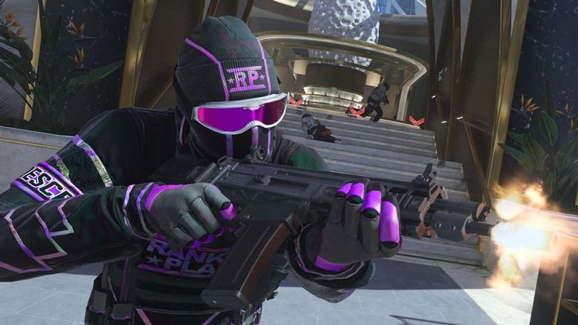 Modern Warfare 3 player firing gun while wearing ranked play skin