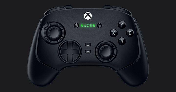 Razer Wolverine V3 Pro product image of a black Xbox-branded controller featuring Razer branding lit up in green in the center.