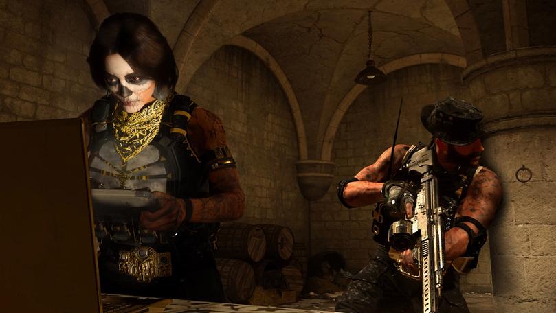 Warzone Valeria looking at computer screen while Price takes cover behind pillar while holding rifle