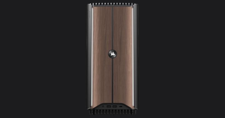 Corsair ONE i500 product image of a black PC case with dark brown wooden front panels.