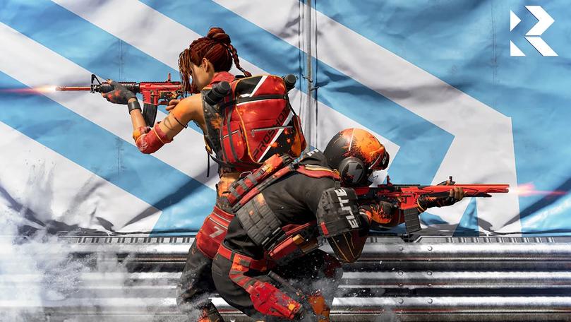 Image of XDefiant players aiming down sights of weapons while standing back to back