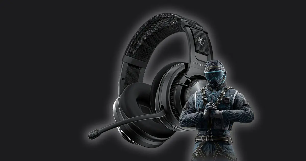 A black, mesh, over-ear headset with a character from Siege in full black and blue gear in front of it.