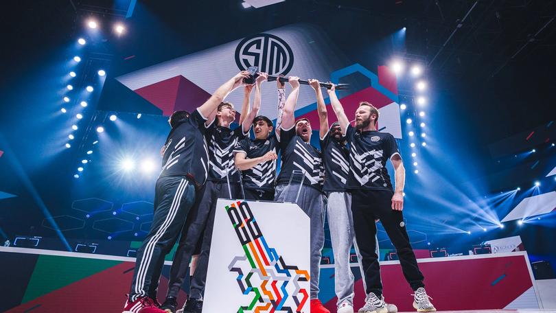 TSM lifting the Six Invitational hammer
