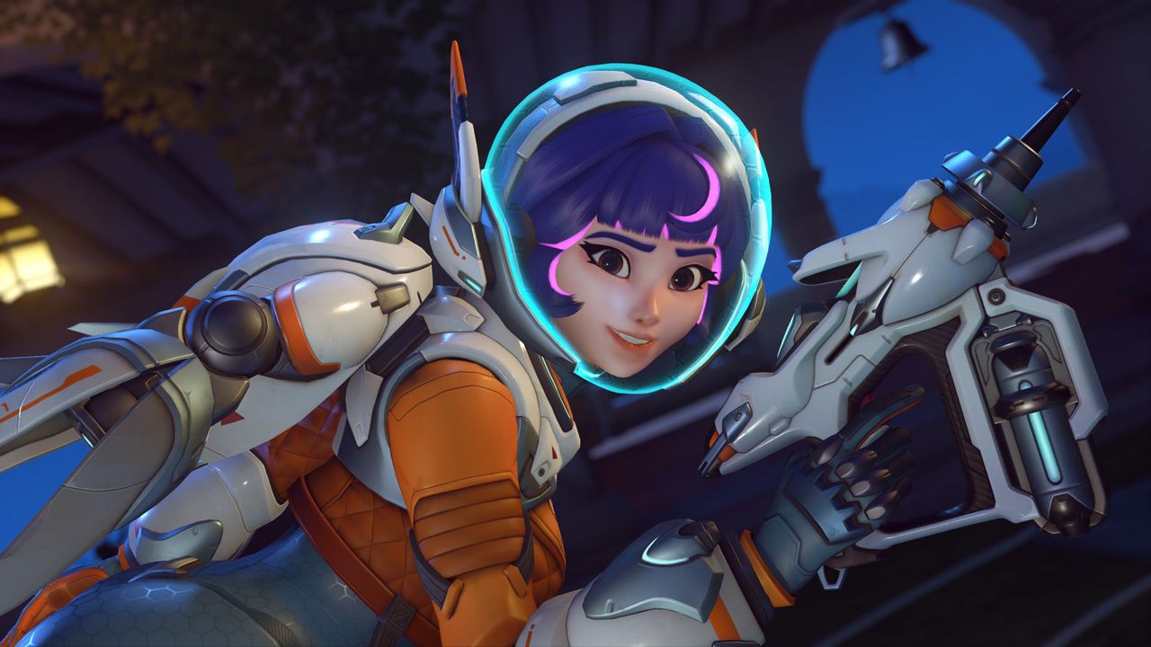 Juno from Overwatch 2 holding her gun and smiling