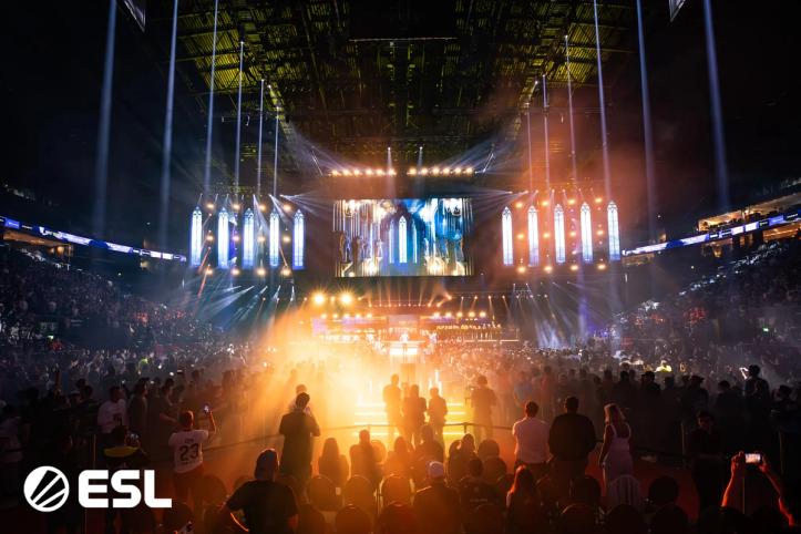 a crowd of people are watching a concert in a stadium .