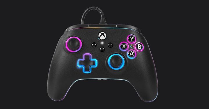 PowerA Advantage with Lumectra product image of a wired black official Xbox controller featuring purple and blue gradient lighting around the buttons.