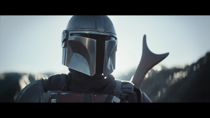 the mandalorian stands kitted out in shining beskar armor