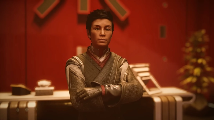 character stands in futuristic monk-like robes