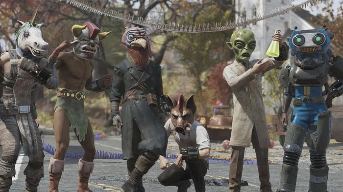 a group of people in costumes are standing next to each other on a street .