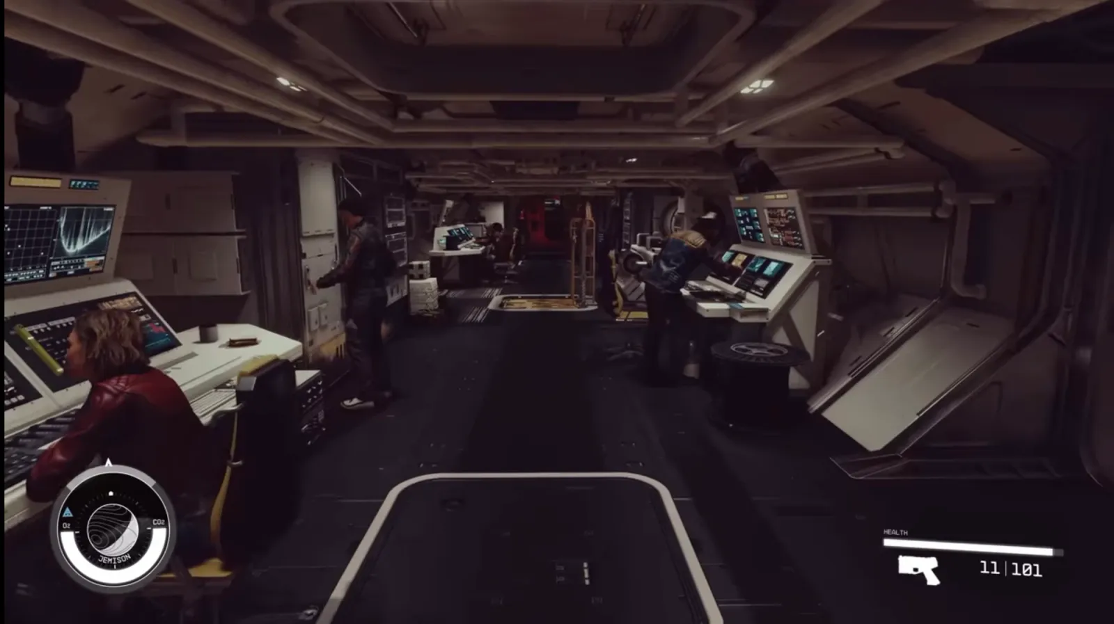 Inside the starship the crew are working at consoles