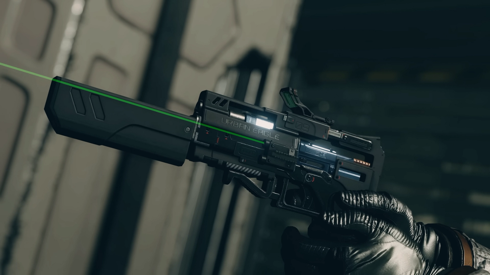 A close up of a suppressed futuristic pistol