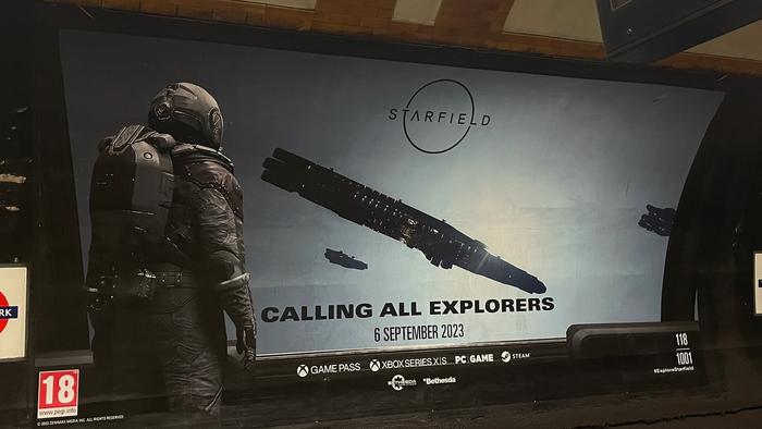 An explore Starfield poster, number 118 astronaut looks at starships
