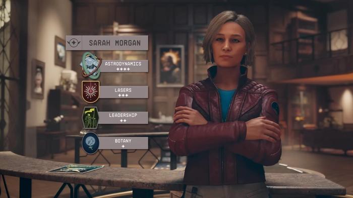 Sarah Morgan stands arms folded