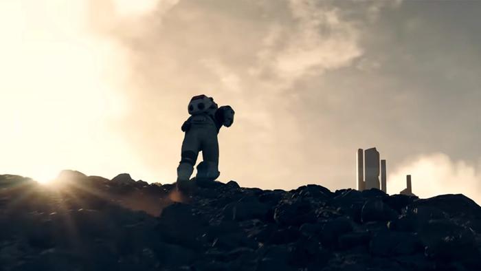 player climbs a rocky hill with a city just ahead
