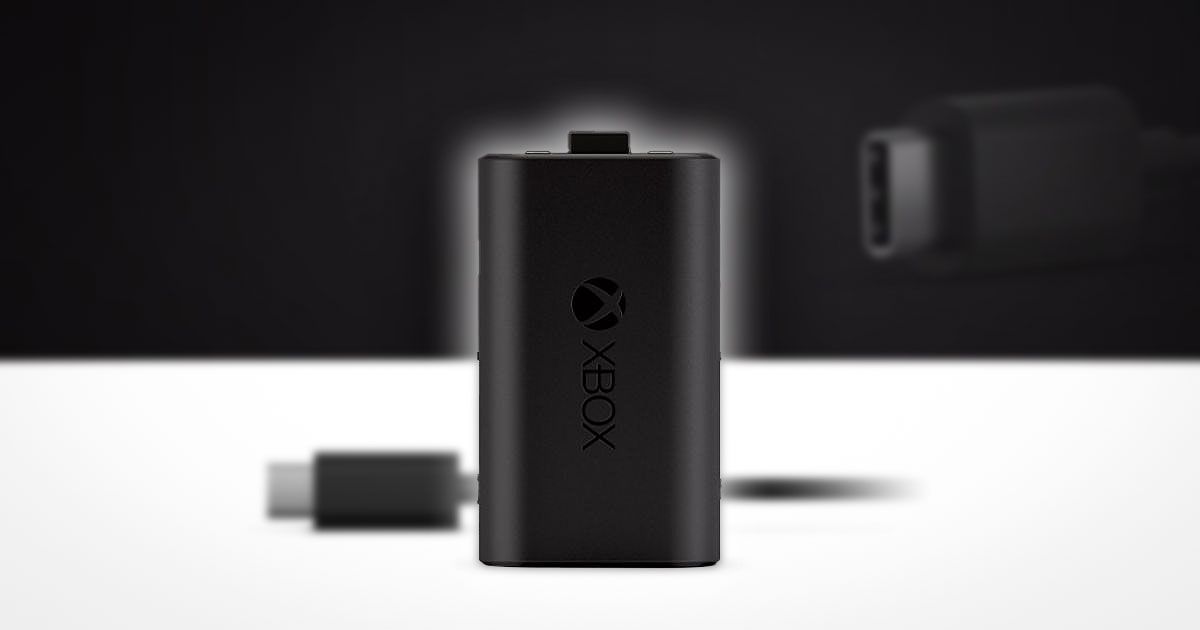 A black Xbox-branded battery pack with a USB-C cable beside it.