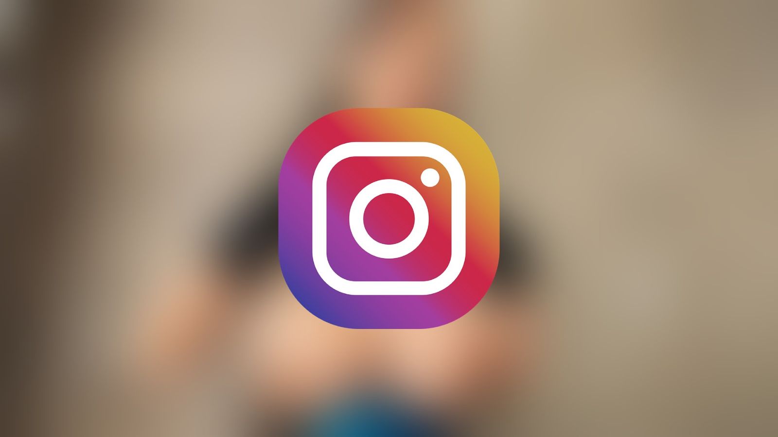 Instagram logo with a blurred background featuring explicit pornographic content.