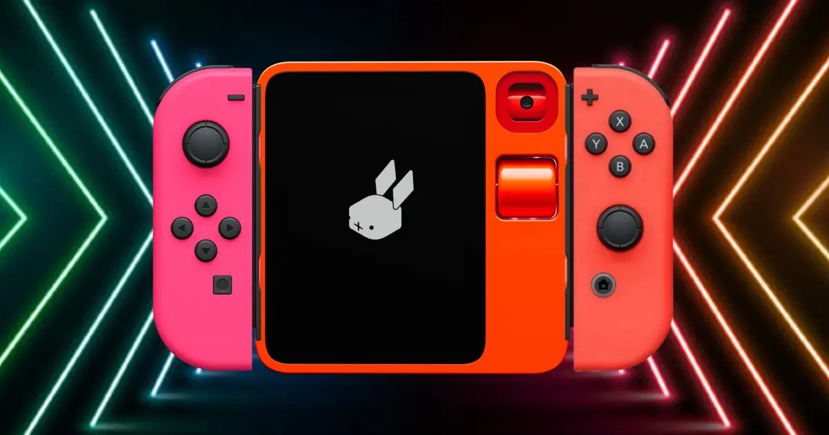 A Rabbit r1 device with two Nintendo Switch Joy-Cons attached to it in front of a Razer neon arrow background