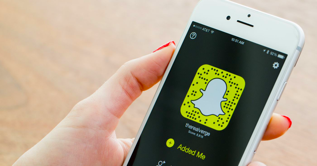 What does "added by mention" mean on Snapchat?